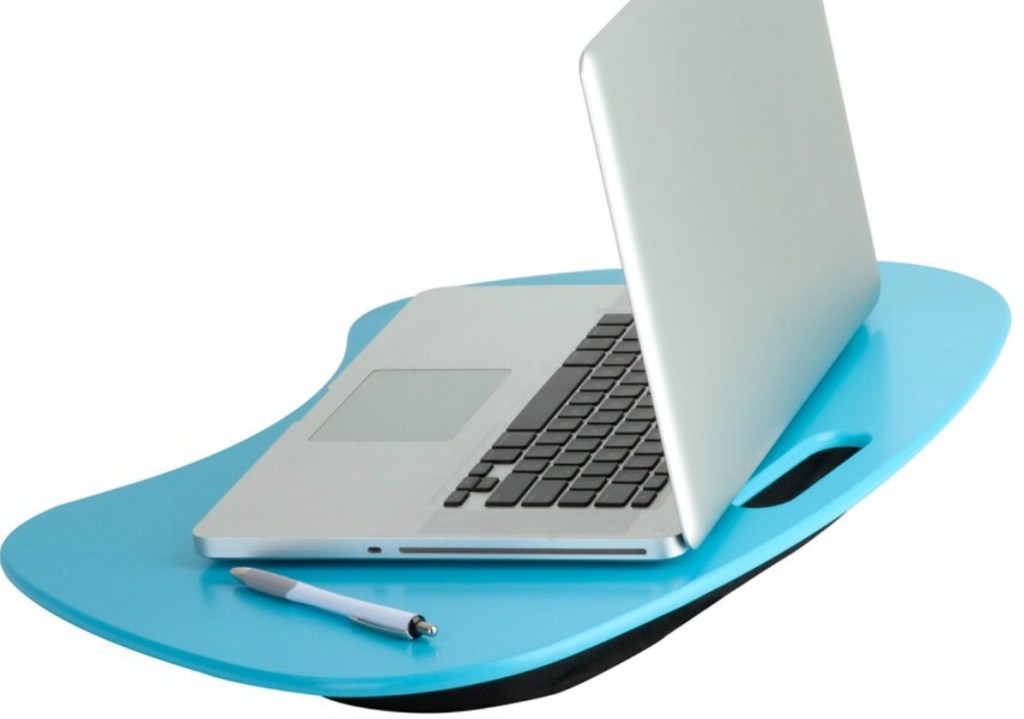 laptop sitting on blue lap sized desk