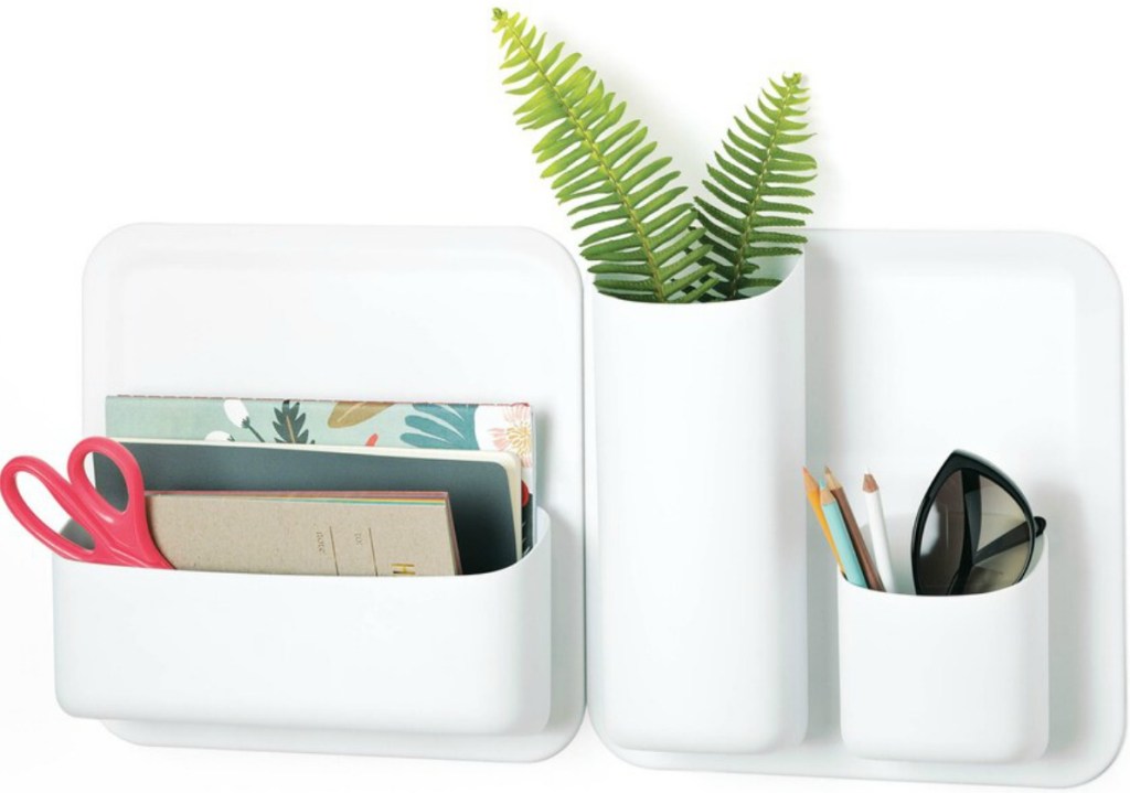 white storage cubes holding office supplies and sunglasses