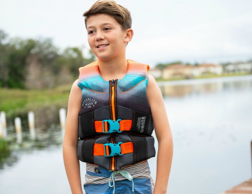 boy wearing life vest