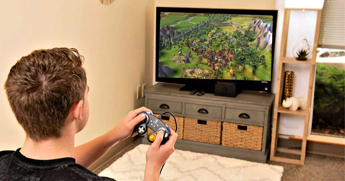 young man playing a video game