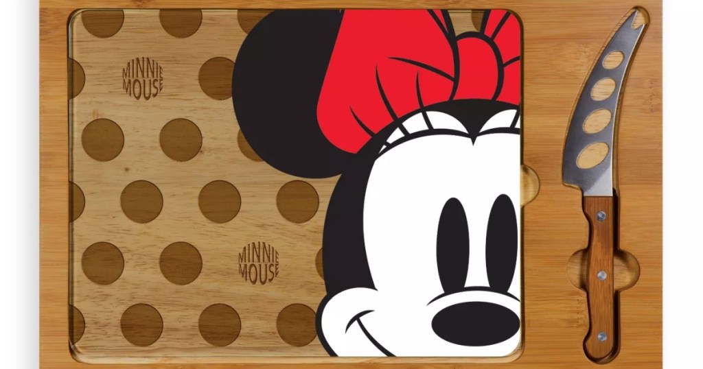 cutting board with Minnie Mouse and a knife