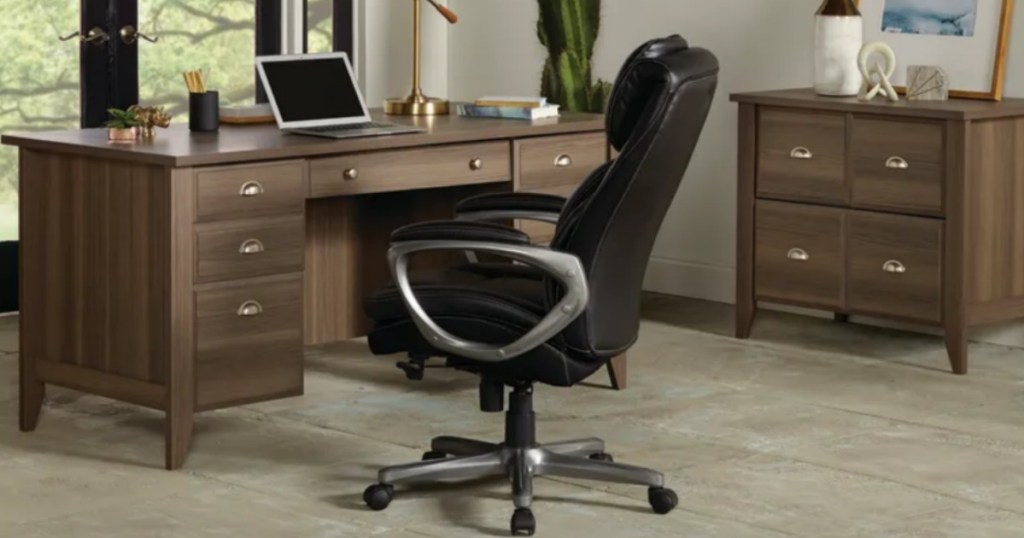 leather office chair by desk in office 