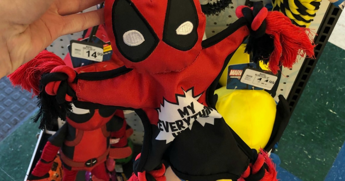 deadpool dog toy held in hand at store