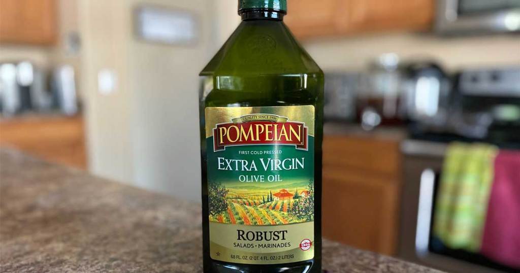 pompeian extra virgin olive oil sitting on a kitchen counter