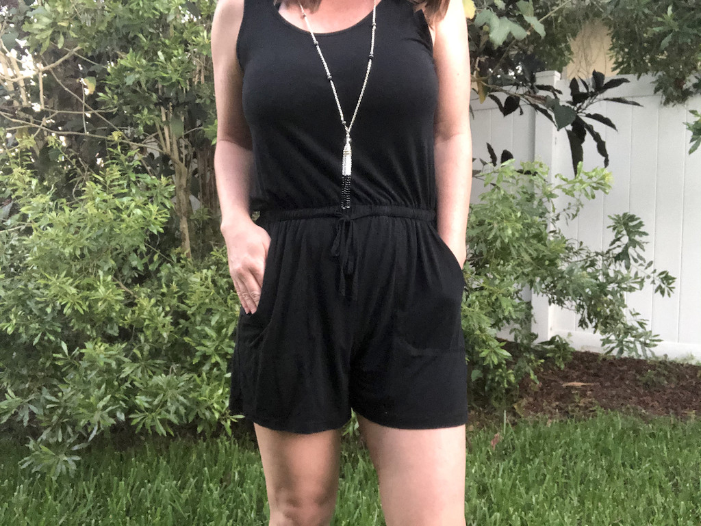 woman wearing black romper with shorts 