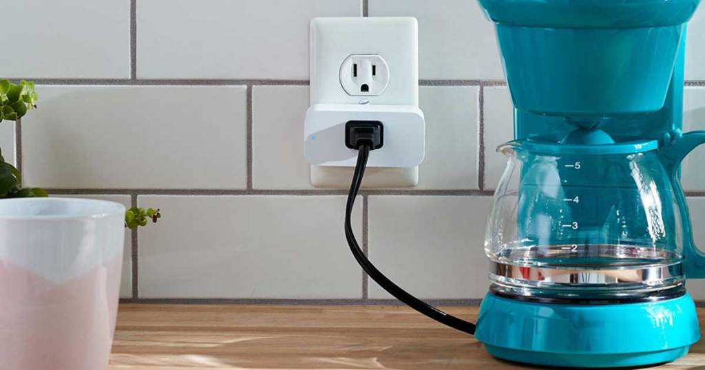 smart plug in wall next to coffee maker