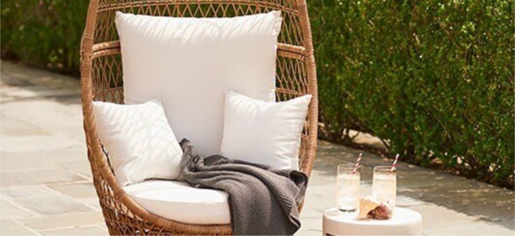 sonoma swivel chair with blanket outside
