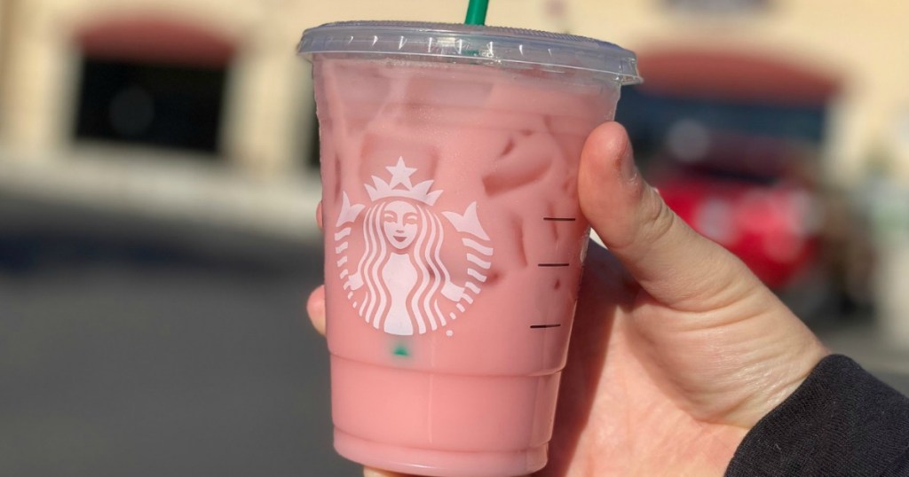 holding Starbucks new iced Guava Passionfruit summer drink