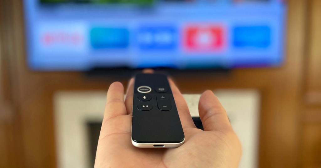 hand holding tv remote