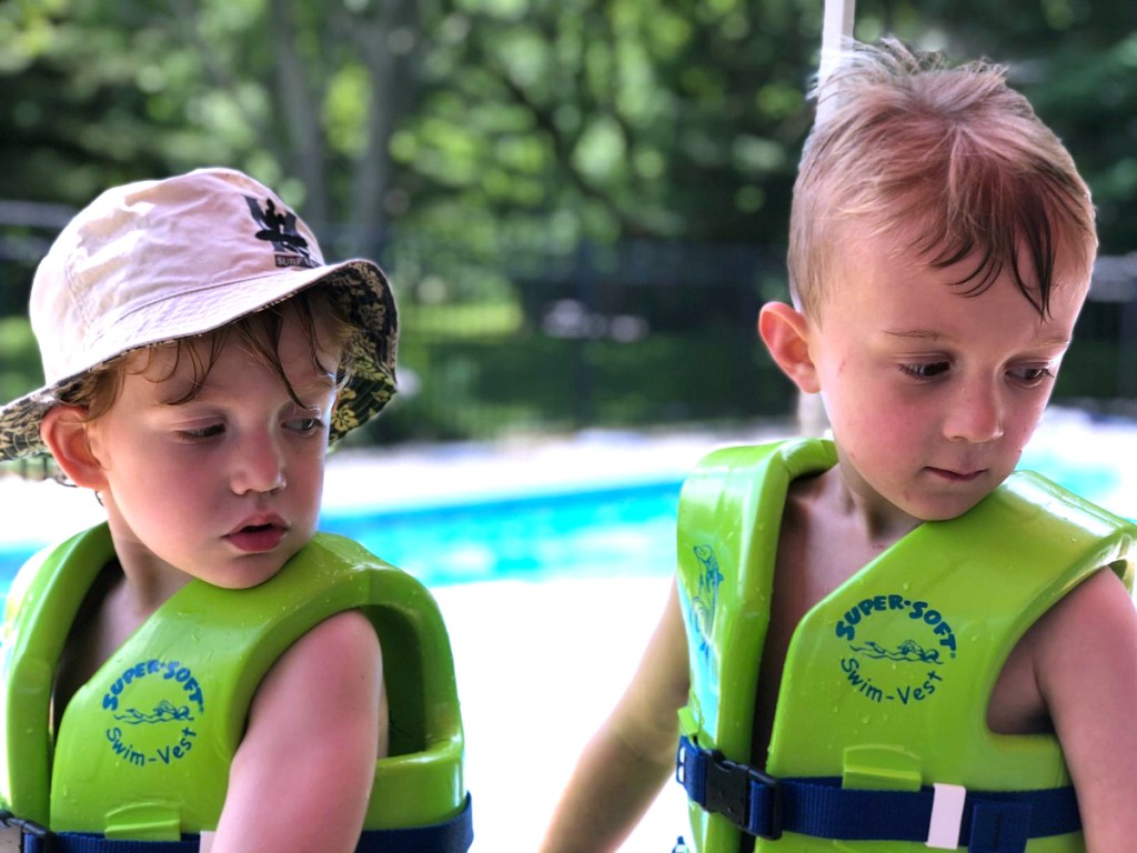 boys wearing life jackets