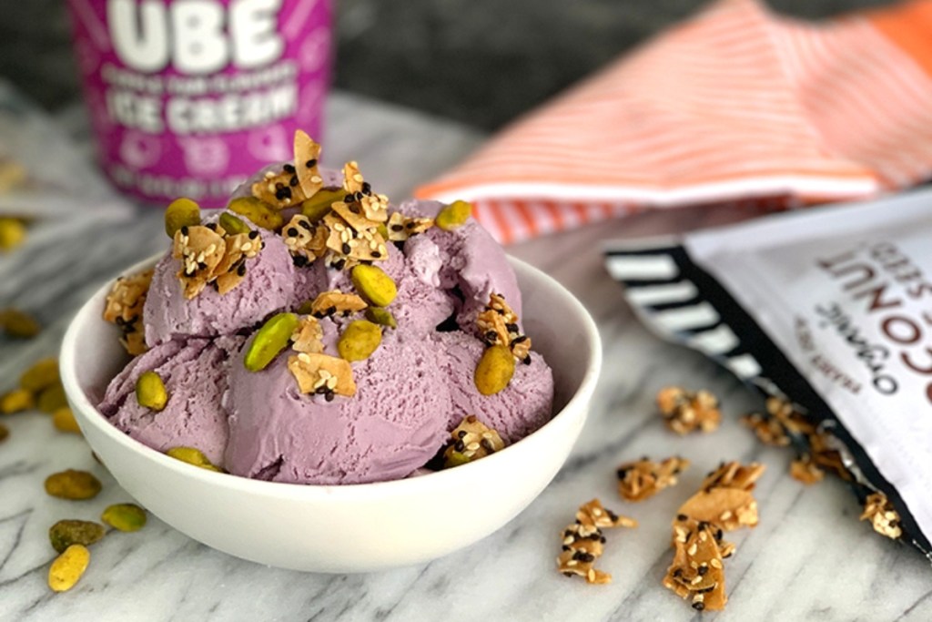 purple ice cream with pistachios in bowl