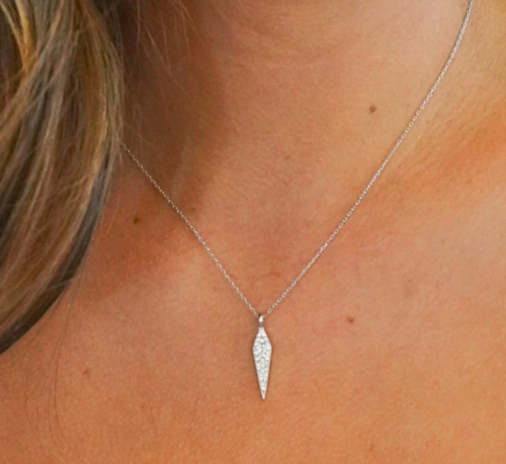 lady wearing uncommon james necklaces