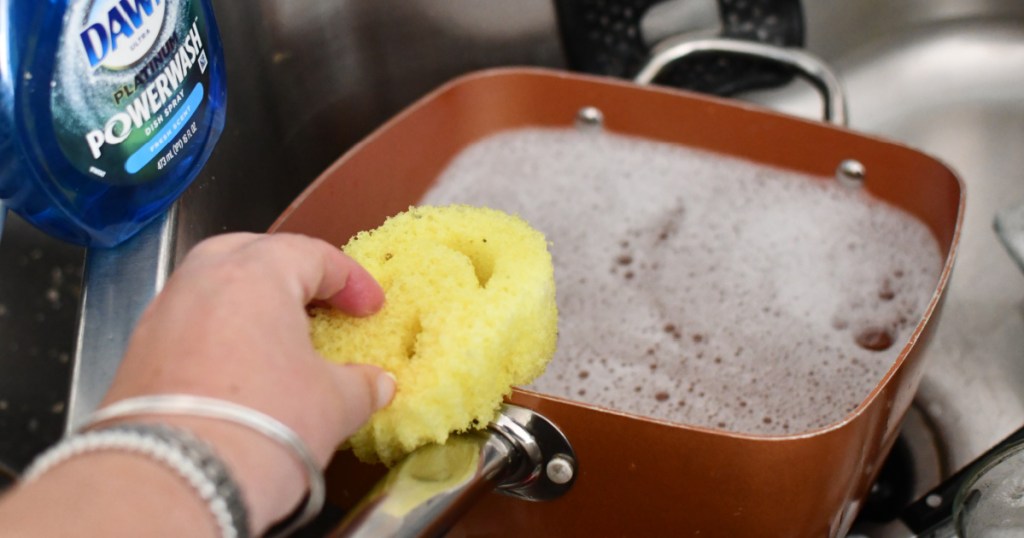 using a scrub daddy on cookware