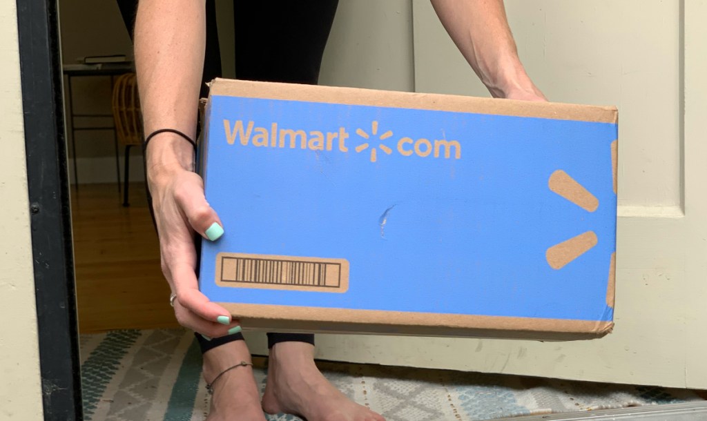 woman holding walmart box