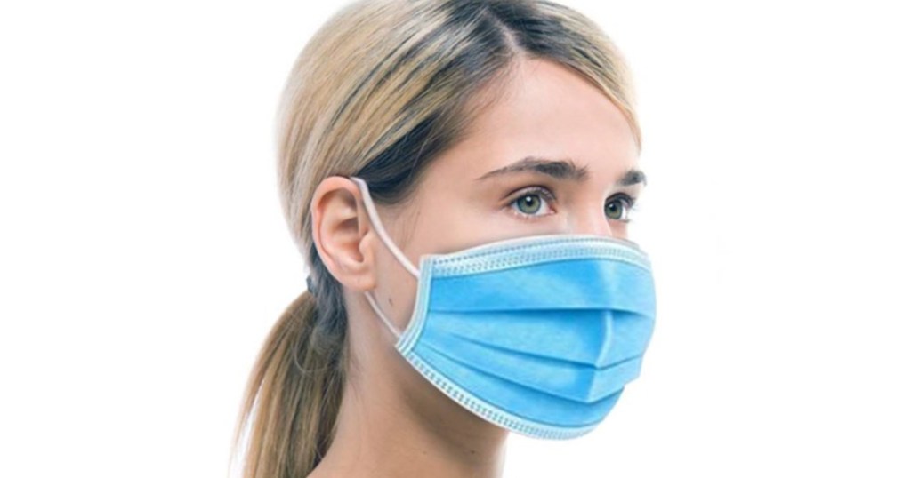 woman wearing disposable face mask
