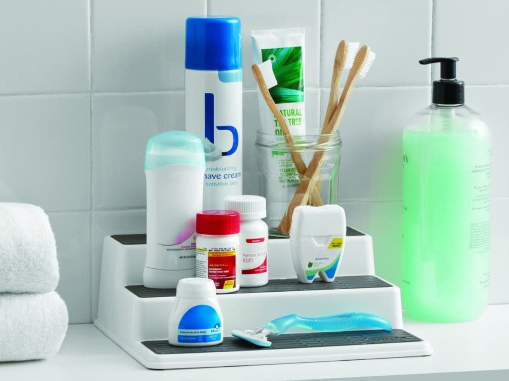 3-tier shelf organizer filled with bath and beauty products