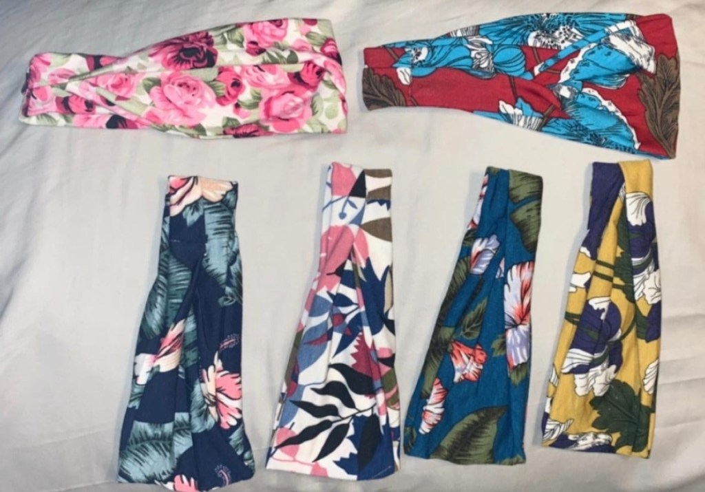 6 cotton headbands laid out on bed