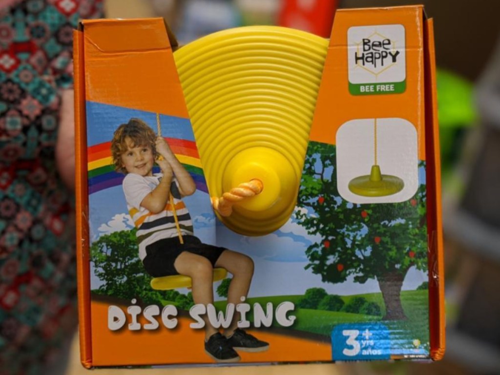 person holding bee happy disc swing in store