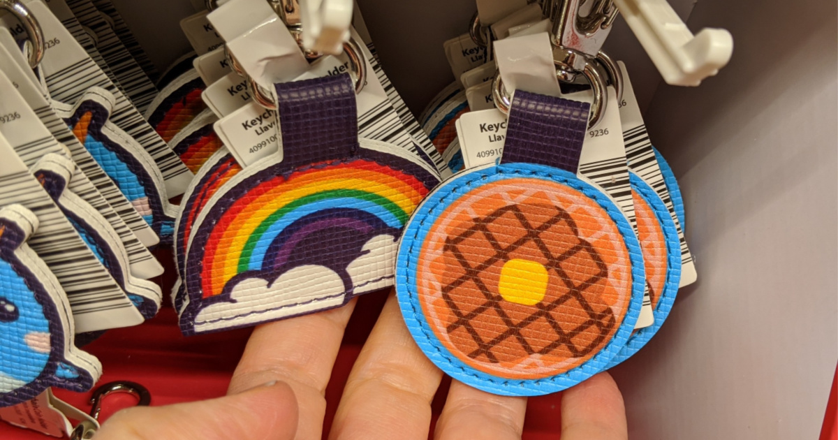 hand touching rainbow and waffle keychain coin holders
