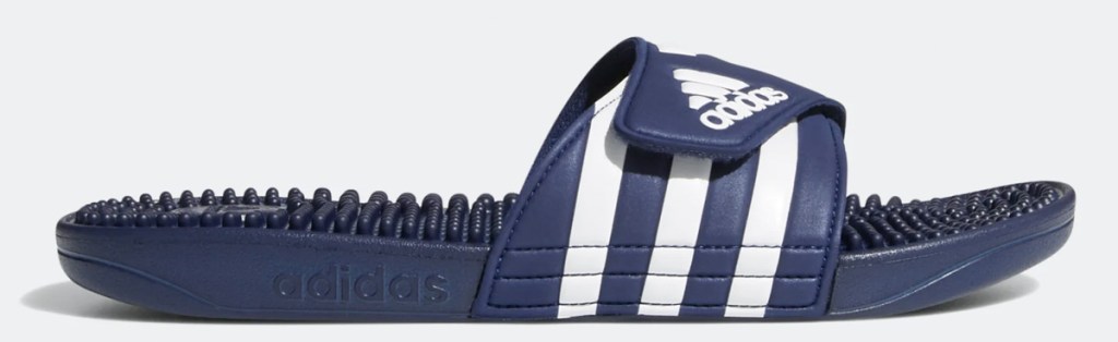 navy blue slide sandal with adidas logo and three white stripes across strap