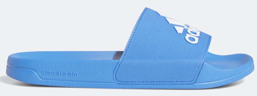 bright blue adidas slide sandal with white adidas logo printed on top strap