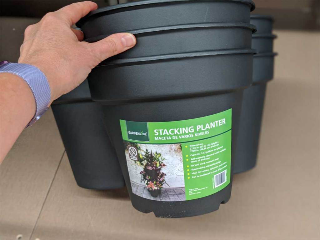 hand holding stacking planter 