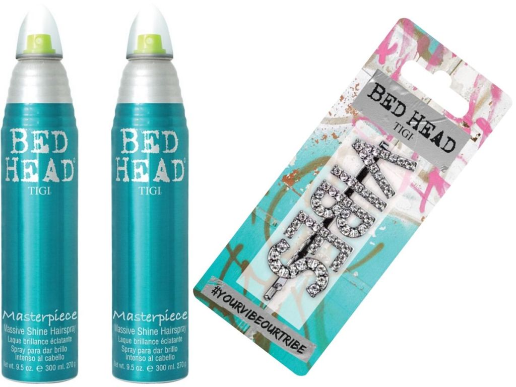 two hairspray bottles and a hairclip