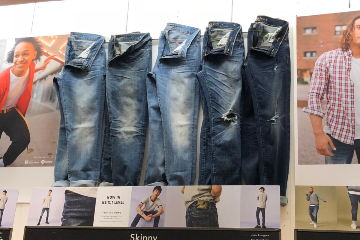 american eagle jeans men hanging on wall