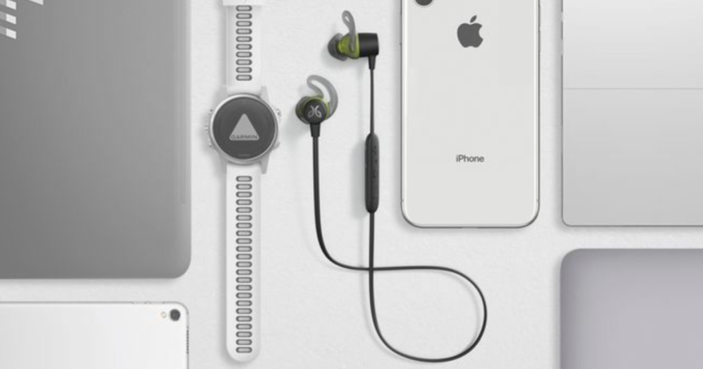 jaybird tarah earphones next to other devices
