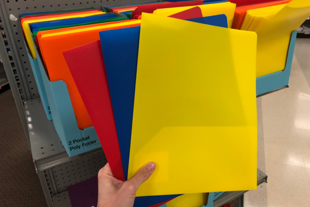 staples folders 2-pocket report cover colorful in hand at store