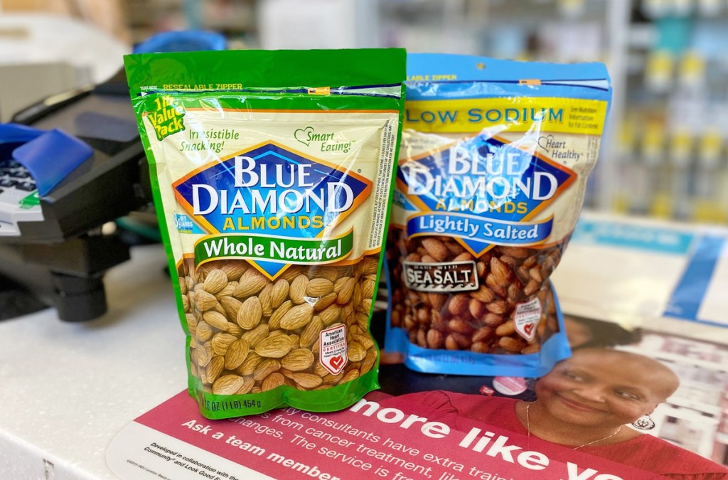 two bags of blue diamond almonds sitting on checkout counter of store