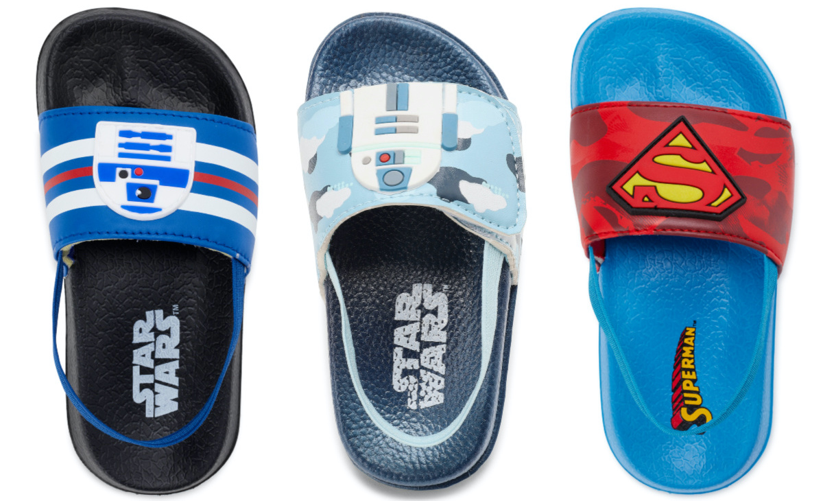 two boys Star Wars slide sandals and one boys Superman slide sandal