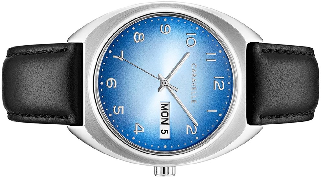 silver colored watch with blue watch face and black leather watch strap