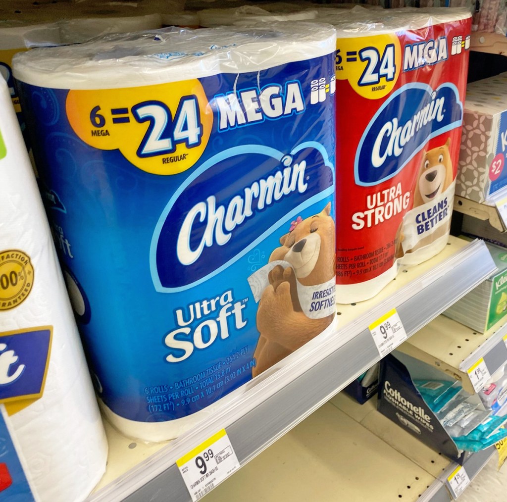 blue and red packages of charmin toilet paper on store shelf