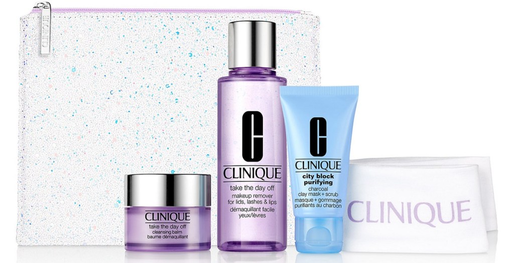 clinique makeup removers and moisturizers next to a white headband and sparkly makeup bag