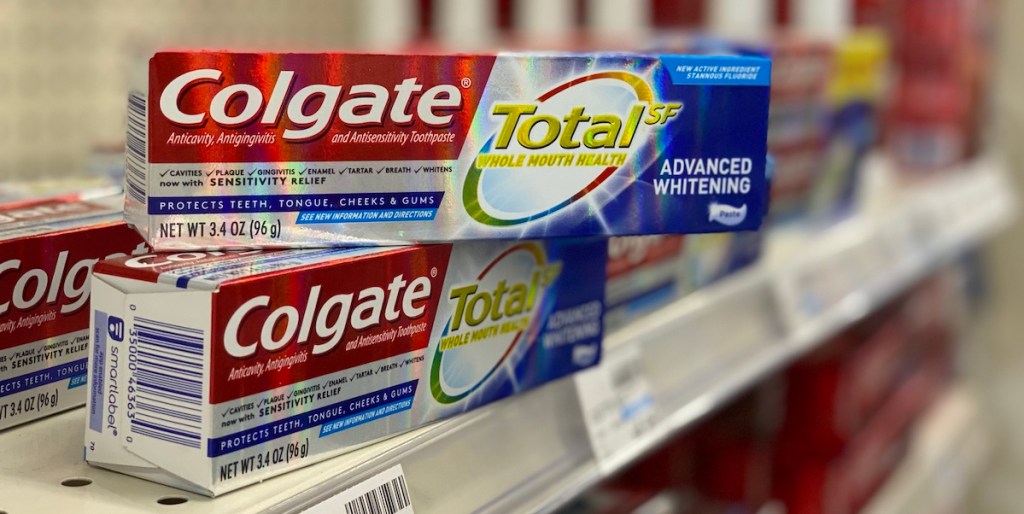 two boxes of Colgate total toothpaste