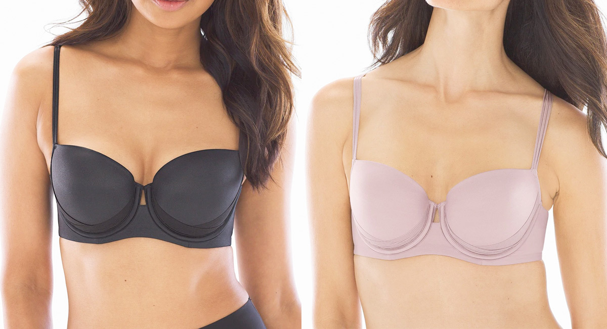 two women modeling bras in black and light purple colors