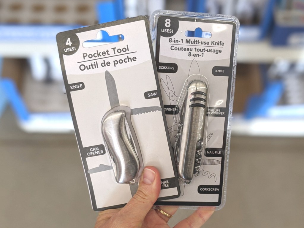 hand holding multi-use tools in store at dollar tree