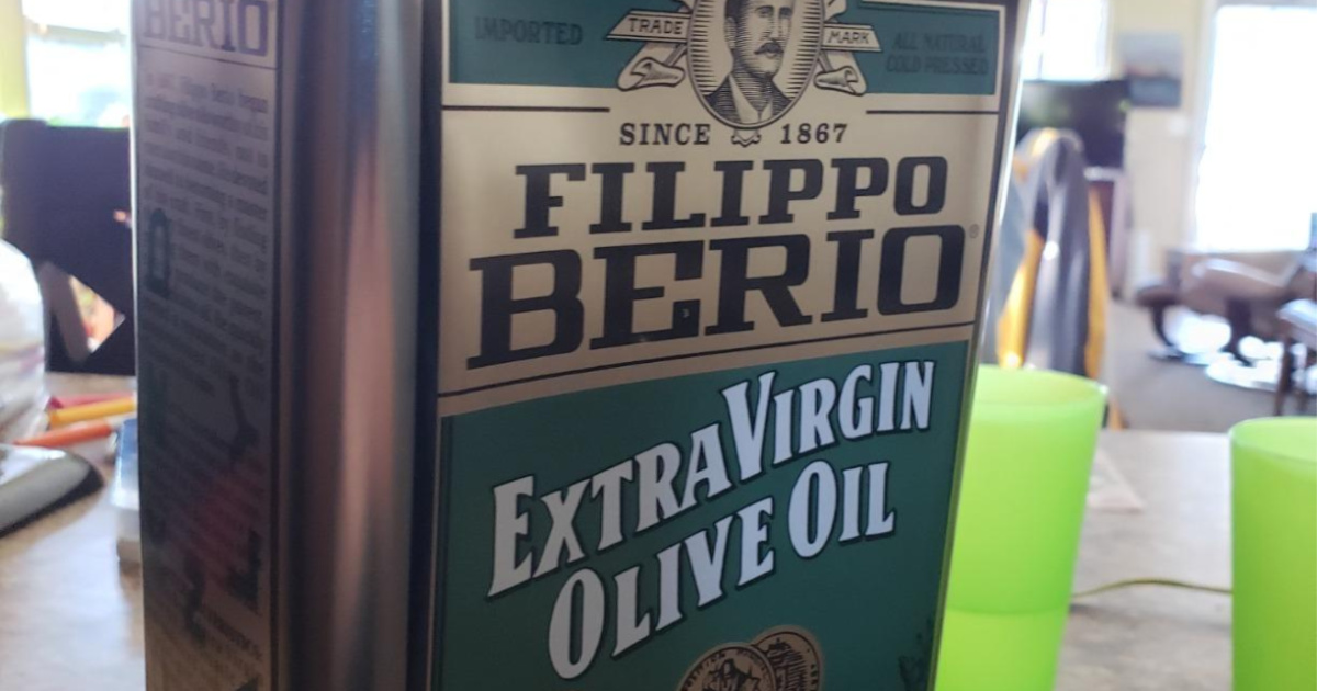 large tin of extra virgin olive oil in home