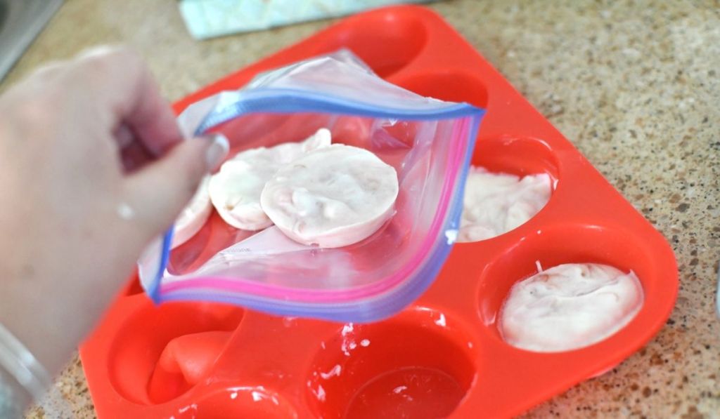 Freezing yogurt dollops in a muffin tin