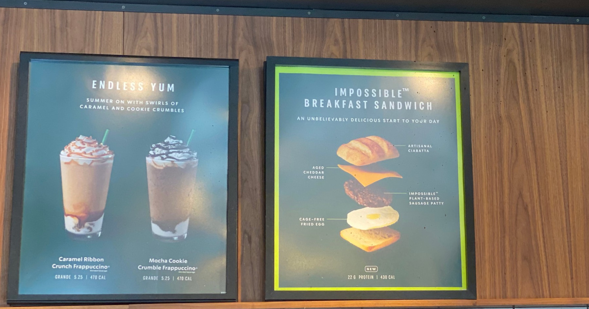 Menu boards with beverages and sandwich 