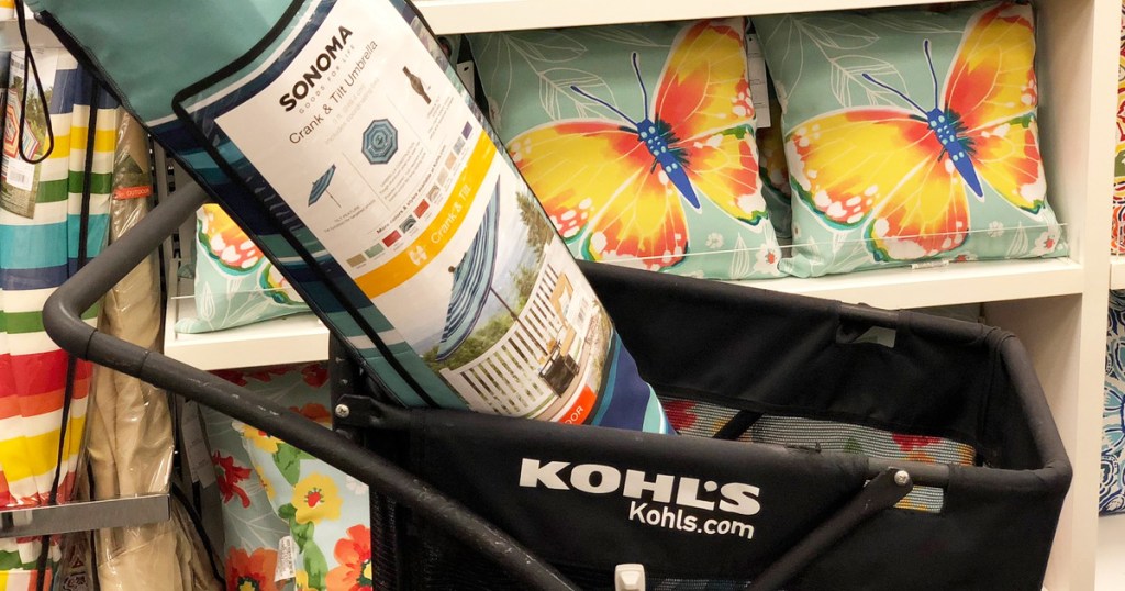 patio umbrella in black kohls shopping cart in front of outdoor throw pillow display