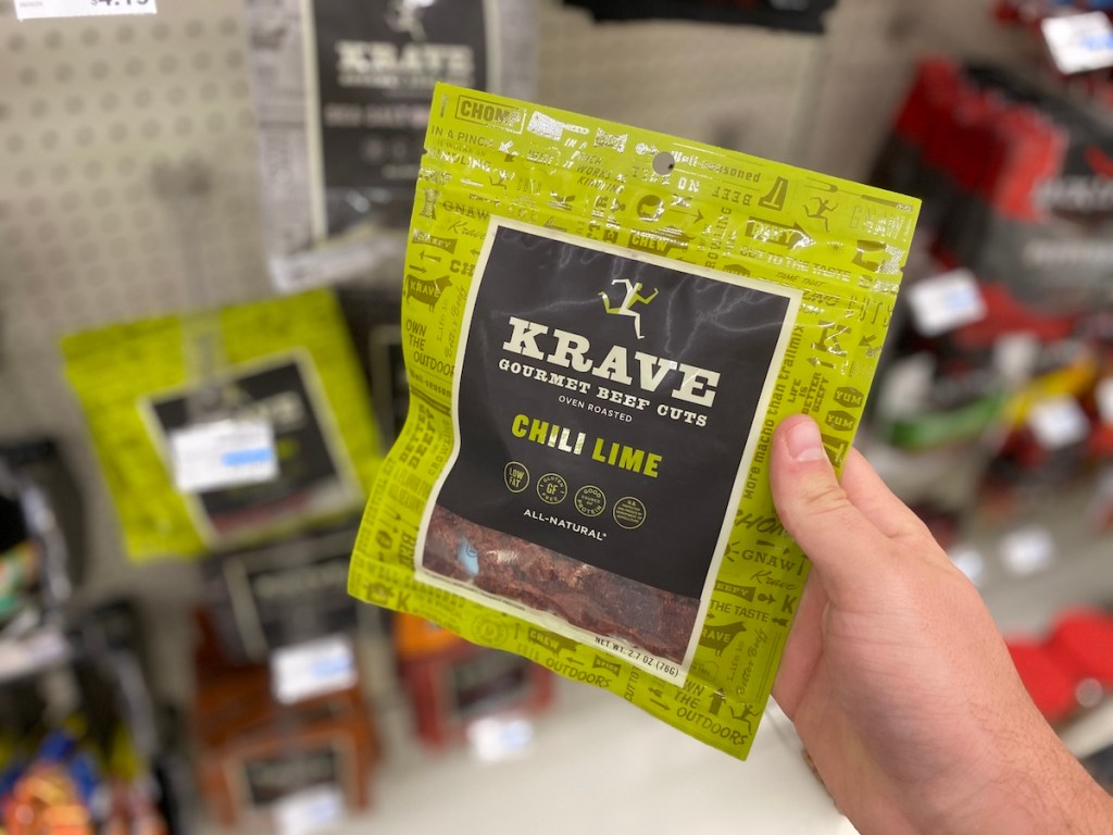 hand holding bag of Krave jerky
