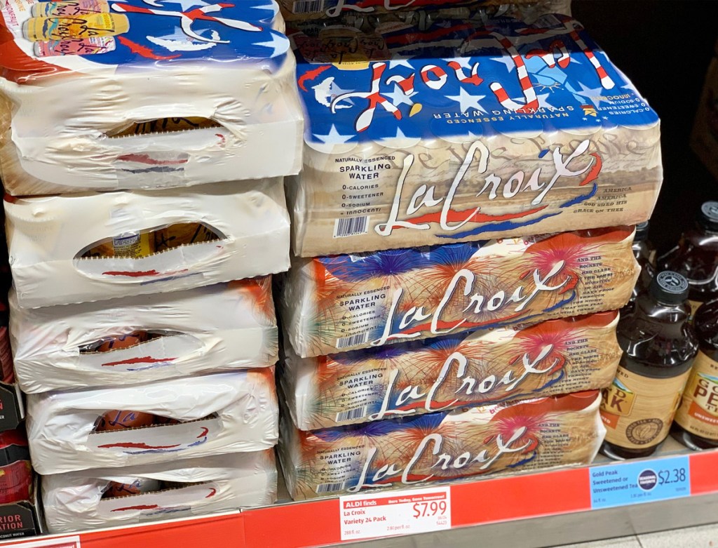 variety packs of la croix sparkling water in patriotic themed wrapping on store shelf