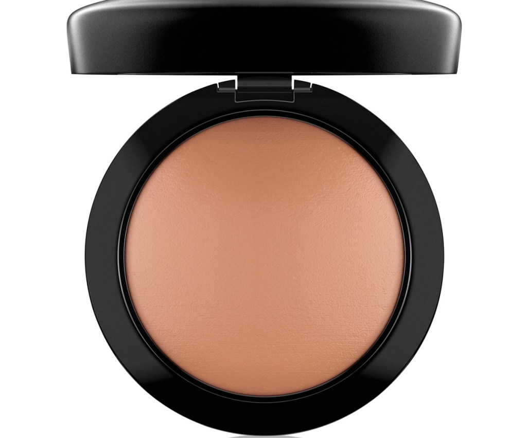 bronze colored face powder in a black round container