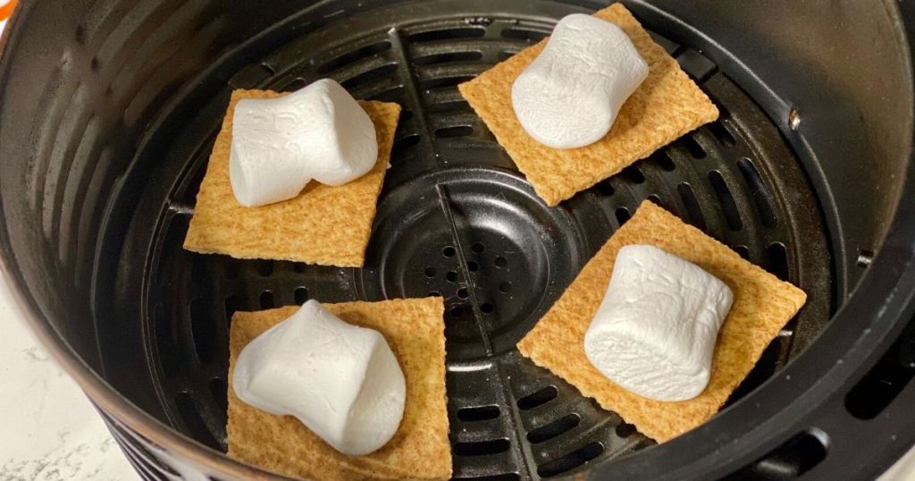 Marshmallows on top of graham cracker halves in the air fryer