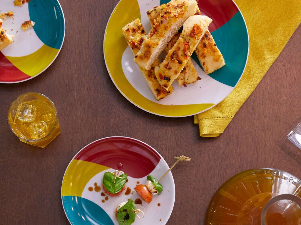 colorful mid-century style plates on a kitchen table