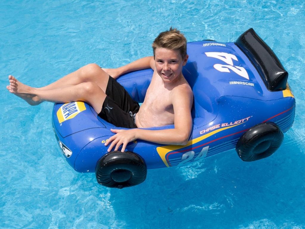 boy in nascar pool float