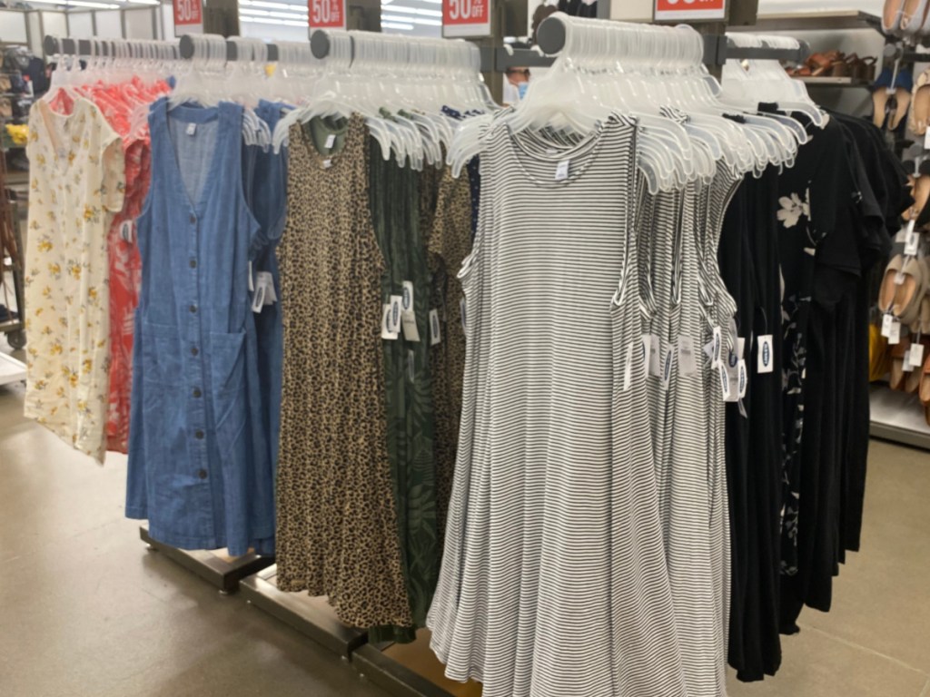 sleeveless dresses hanging in store