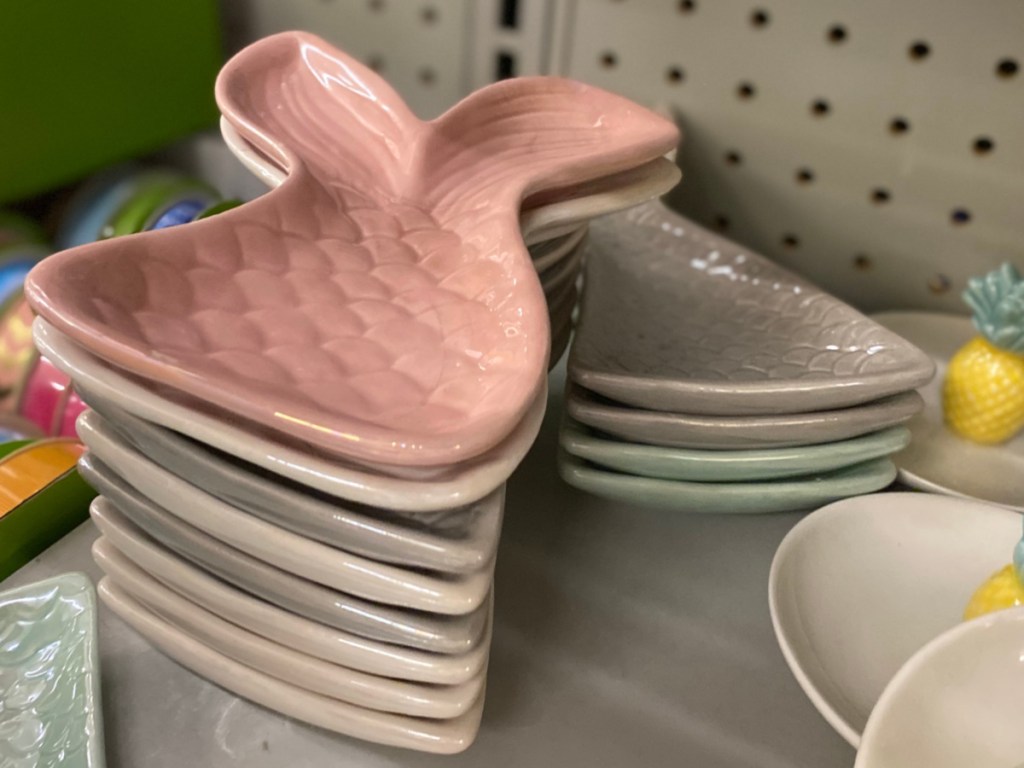 small mermaid tail decor dishes on store shelf